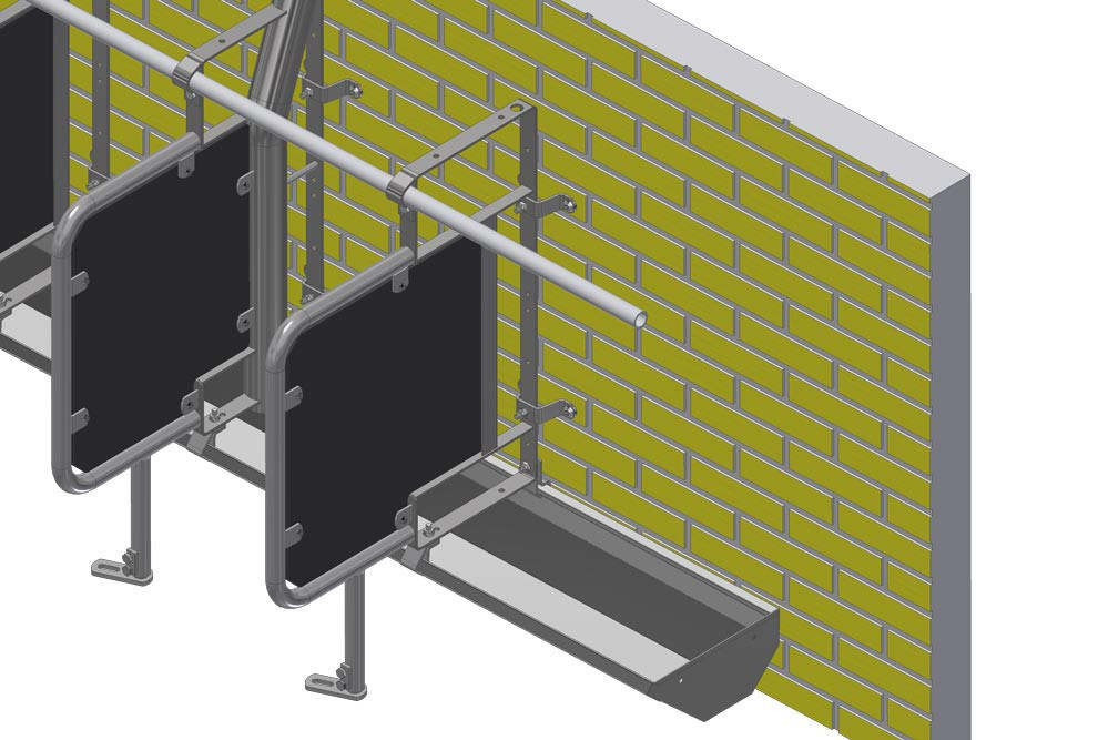 Feed partition mounted against wall